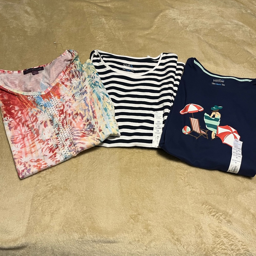 Three - short sleeved ladies T-shirts.